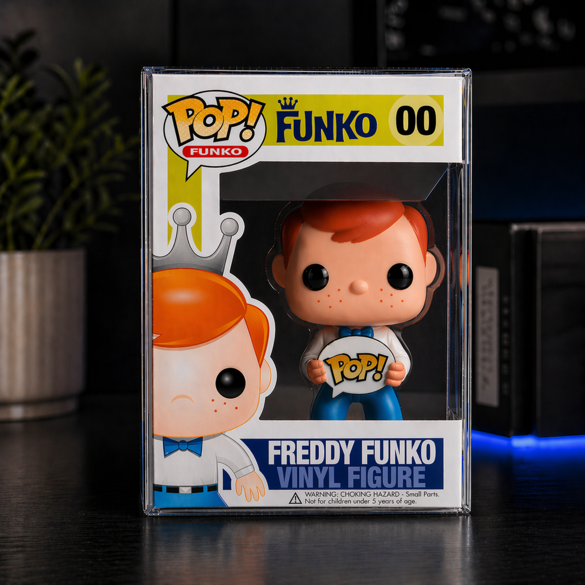 Boxed Freddy Funko displayed inside a POP JUNKIE ZERO clear Pop protector; figure not included