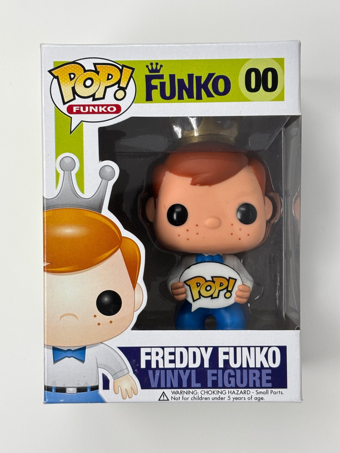 Freddy Funko #00 blue bow tie holding Pop sign – actual box front