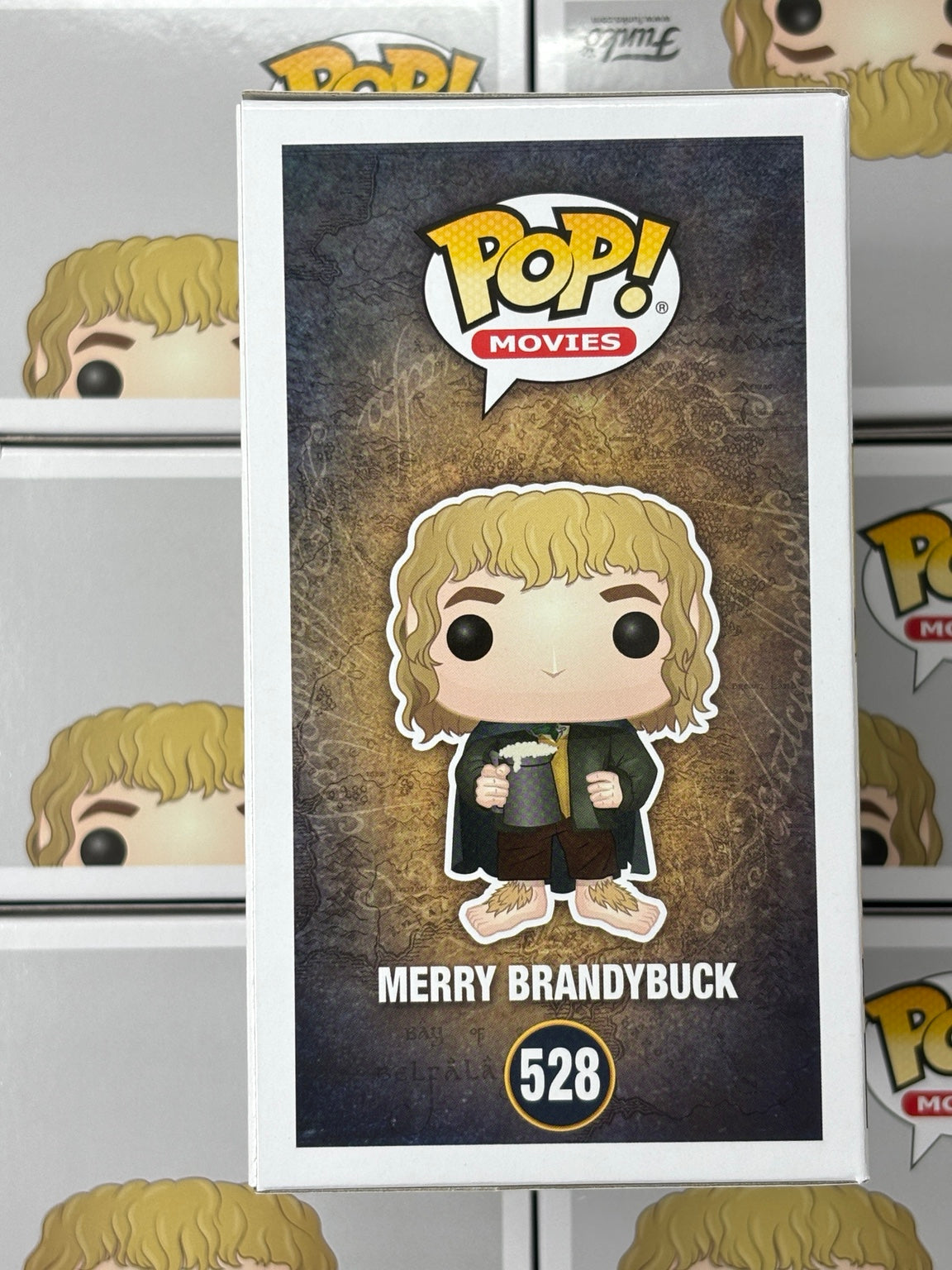 Merry Brandybuck #528 – Rock Box Toys warehouse photo of illustrated side of box