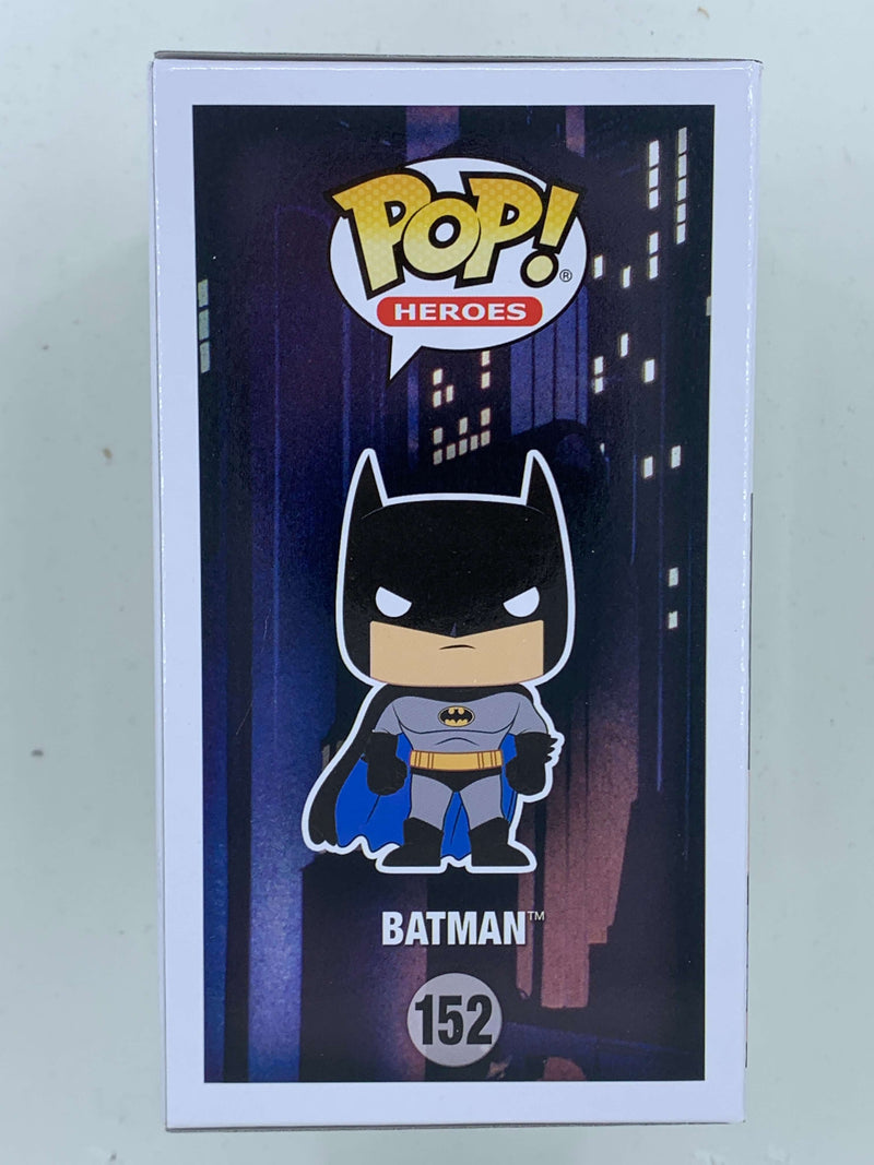 Stylized Batman action figure in front of city skyline, part of the Funko Pop! Heroes collection, NFT digital collectible.